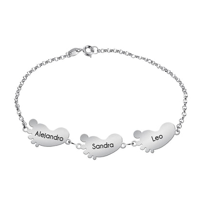 Bracelet en argent avec motifs petits pieds