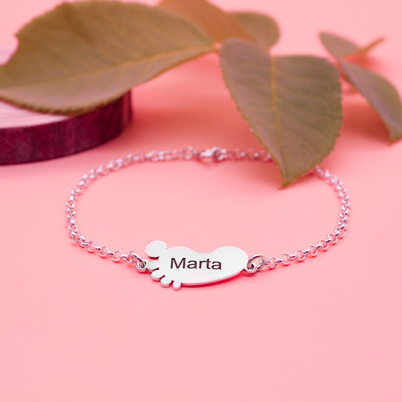 Bracelet en argent avec motifs petits pieds