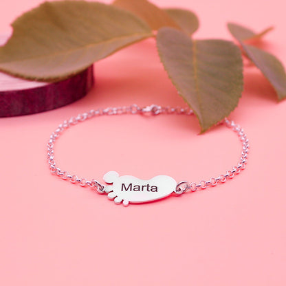 Bracelet en argent avec motifs petits pieds